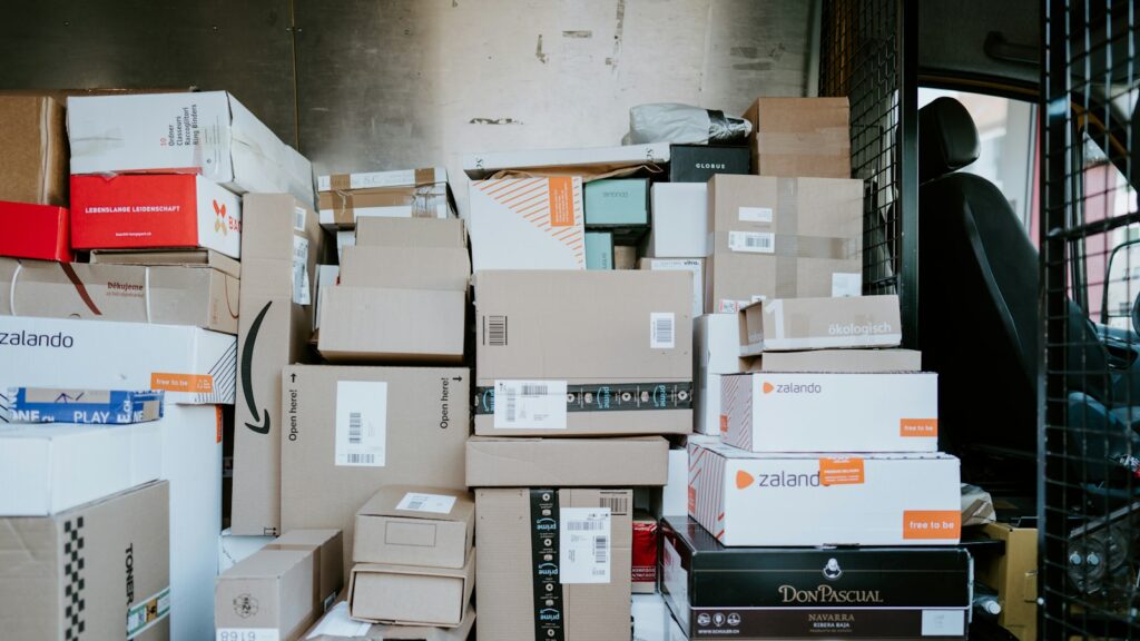 Stack of online retail shipping packages