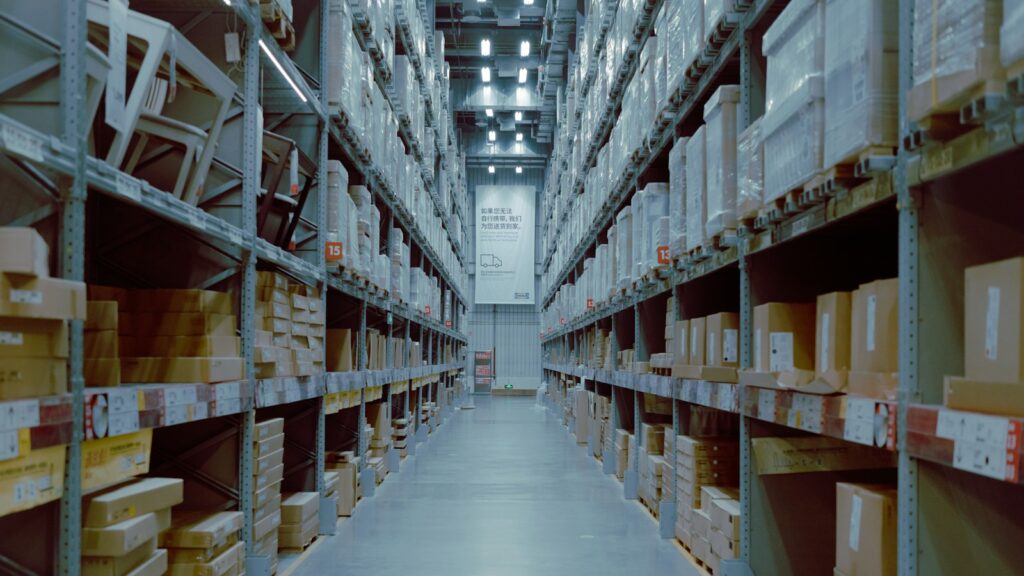 Warehouse aisle with inventory on shelves
